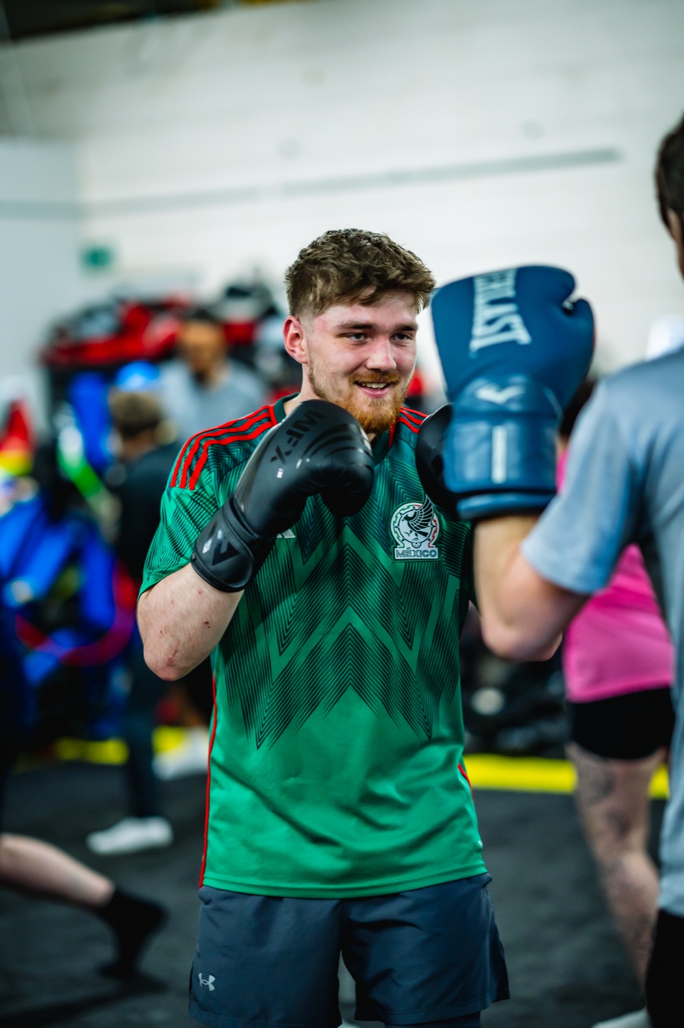 Industry Rumble participant training with boxing gloves